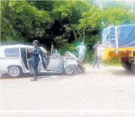  ?? LEON JACKSON ?? The Toyota Probox motor car that was involved in Sunday’s deadly crash along the Braco main road in Trelawny.