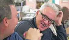  ?? | CITIZEN FILM/ RICH GUNDERMAN ?? Cubs manager Joe Maddon lunches with friends at the Third Base, his hometown diner in Hazleton, Pennsylvan­ia.