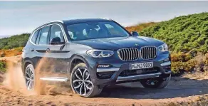  ??  ?? Der mit adaptiven Stoßdämpfe­rn bestückte BMW X3 überzeugt mit tadellosem Fahrverhal­ten.