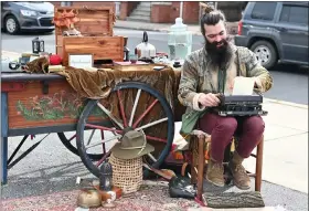  ?? ?? Poet Vincent Tavani of Phoenixvil­le crafts one-of-a-kind custom poems at Beary Loved: A Valentine’s Stroll Through Boyertown on Feb. 12.