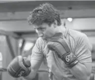  ?? CARLOS OSORIO/TORONTO STAR ?? Liberal Leader Justin Trudeau, visiting a gym in Toronto Thursday, will have to be in fighting form to defend himself from Conservati­ve attack ads.