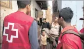  ?? PICTURE: AP ?? Red Cross volunteers talk to villagers about the plague outbreak, 30 miles west of Antananari­vo, Madagascar, Monday.