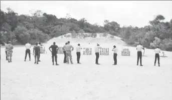  ??  ?? Lawmen being supervised by their trainers during a live firing drill at Base Camp Stephenson yesterday