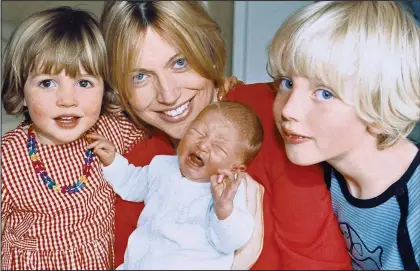  ??  ?? Pressure: Helen Nicoll, with her son and two girls in 2000, was said to have pushed her children to excel