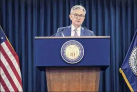  ?? Eric Baradat / Getty Images ?? Federal Reserve Chairman Jerome Powell said the economy and job market are far from fully recovered and that full employment would not be achieved this year.