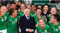  ?? STEPHEN MCCARTHY/SPORTSFILE ?? The President of Ireland Michael D Higgins with some of the Republic of Ireland players after last night’s match at Tallaght Stadium