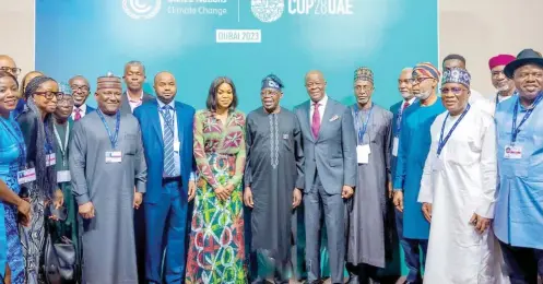  ?? ?? President Bola Tinubu (middle) with delegates from Nigeria at the just concluded UN Climate Summit (COP28) in United Arab Emirates