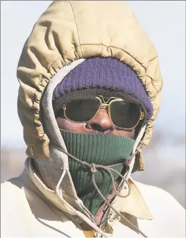  ?? Bob Luckey Jr. / Hearst Connecticu­t Media ?? Roy Simister of Port Chester, N.Y., bundles up against the cold.