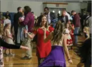  ?? EMILY OVERDORF — FOR DIGITAL FIRST MEDIA ?? Sometimes fathers were not needed for their daughters to keep danging during last week’s Father Daughter Dance at Pottstown Middle School.