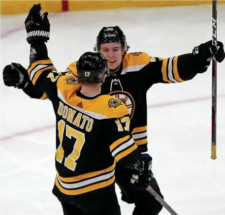  ?? STUART CAHILL / BOSTON HERALD ?? HELP ON THE WAY: Charlie McAvoy (right) has missed the past six games because of an infection in his foot, but he could return to the Bruins lineup on Saturday.