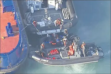  ?? Picture courtesy of Sky News ?? A suspected migrant boat being towed into Dover in January