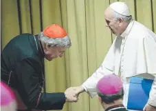  ?? Picture: GETTY ?? Pope Francis greets Cardinal Pell at the Vatican.