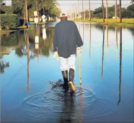  ?? SPENCER PLATT/GETTY ?? Texas is already suffering the effects of Hurricane Harvey. Now, mosquitoes are a threat.