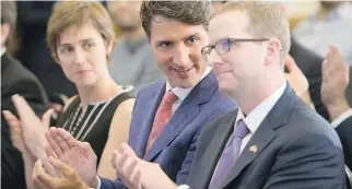 ?? CHRISTINNE MUSCHI ?? Prime Minister Justin Trudeau with Mike Schroepfer, Facebook’s chief technology officer, and McGill University professor Joëlle Pineau at a press conference on Friday.
