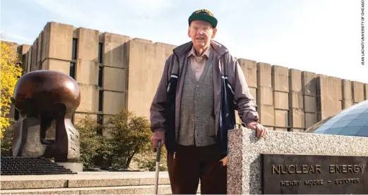  ??  ?? Ted Petry stands near Henry Moore’s “Nuclear Energy” sculpture that commemorat­es the site of the first controlled nuclear reaction at the University of Chicago.