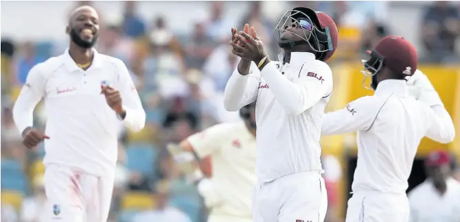  ?? FILE ?? Windies players celebratin­g the dismissal of England’s Ben Foakes during day four of a Test match between both sides at the Kensington Oval in Bridgetown, Barbados, on Saturday, January 26, 2019.