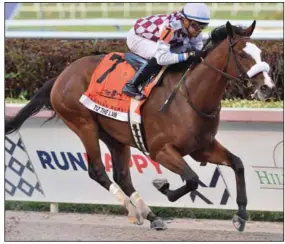  ?? (AP/Coglianese Photos, Gulfstream Park/Ryan Thompson) ?? Tiz the Law, with jockey Manny Franco aboard, ran away in the stretch to easily win the Florida Derby on Saturday at Gulfstream Park in Hallandale Beach, Fla.