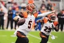  ?? ERIC RISBERG/THE ASSOCIATED PRESS ?? AJ McCarron of Cincinnati gets his second start this season Monday night at Denver in a game with seeding implicatio­ns.