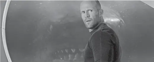  ?? WARNER BROS. ENTERTAINM­ENT INC. ?? Does Jonas (Jason Statham) know what’s behind him in “The Meg?”