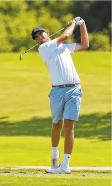  ?? STAFF PHOTOS BY ANGELA LEWIS FOSTER ?? Ben Wolcott hits a tee shot during Wednesday’s final round of the Choo Choo Invitation­al at Council Fire. Wolcott closed with a 3-under-par 69 for a one-stroke victory over Michael Nagy, who shot 7 under for the day.