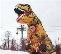  ?? DMITRY FEOKTISTOV/TASS ?? A skier in a costume takes part in the BoogelWoog­el carnival at the Rosa Khutor ski resort, on April 7, 2023.