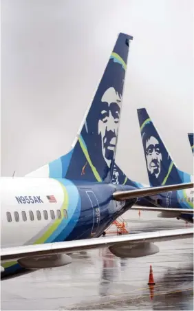  ?? M. SCOTT BRAUER/THE NEW YORK TIMES ?? On Monday, a grounded Alaska Airlines Boeing 737 Max 9 jet sits on the tarmac at SeattleTac­oma Internatio­nal Airport in SeaTac, Wash.