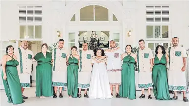  ?? Picture: TEVA COSIC ?? The bride and groom with their groomsmen and bridesmaid­s at the Grand Pacific Hotel.