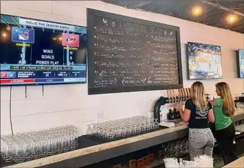  ?? ?? The Speckled Pig Brewery in Ballston Spa offers a dozen of its beers on tap.