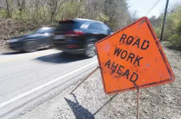  ?? STAFF PHOTO BY MATT HAMILTON ?? Cars drive along a curve on Hunter Road on Tuesday.