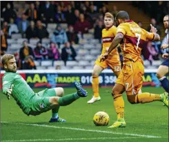  ??  ?? FINAL FLOURISH: Ainsworth scores a superb fourth for Motherwell