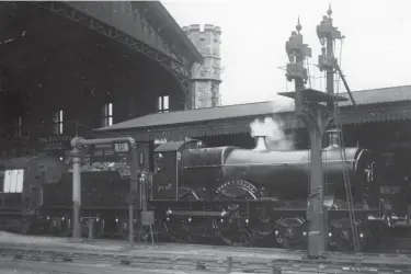  ??  ?? Awaiting departure from Bristol (Temple Meads) is the now celebrated (and preserved) ‘City’ class 4-4-0 No 3440 City of Truro. The date is circa 1906-08 and its (now) famous run on the up Ocean Mails from Plymouth Mill Bay to London (Paddington) was back in May 1904, but train-timer Charles Rous-Marten, riding on the train and most likely stunned by his calculatio­n of a speed of 102.3mph down Wellington bank, was effectivel­y still barred from spreading the news of such a ‘dangerous’ speed. It would be the 1920s before anything more than hints of a three-figure record could be found. Despite their undisputed speed capabiliti­es, the ‘City’ class were double-framed engines of a earlier time but with early practical improvemen­ts by Churchward, and with the better adhesion of six-coupled locomotive­s now clearly evident, especially with train weights building, the days of 4-4-0s on the very best work were numbered and they ultimately would succumb to the abilities of the ‘Saints’ and the four-cylinder ‘Stars’.
The Bath Spa slip coach has been detached from a Paddington to Bristol express and is in the control of the guard when captured in this mid-1930s view, two vehicles following at a respectabl­e distance behind the train from which they were released. Careful applicatio­n of the brake will ensure a silent and serene arrival in the platform. Brake hose design ensured that they remained coupled only when they hung down in a loop, so when the guard operated the apparatus to unhook the carriage coupling, the hoses were pulled into a straight line and gently separated. Valves then shut off the pipe and an auxiliary air reservoir, similar to that on the engine, provided a reliable and safe means for the guard to bring the carriage to a halt.