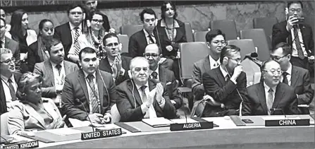  ?? Weiss/AFP) (Angela ?? (From L) US Ambassador to the United Nations Linda Thomas-Greenfield, Algeria’s Ambassador to the UN Amar Bendjama and Chinese Ambassador to the UN Zhang Jun applaud during a United Nations Security Council meeting demanding an immediate ceasefire in Gaza, at the UN headquarte­rs in New York.