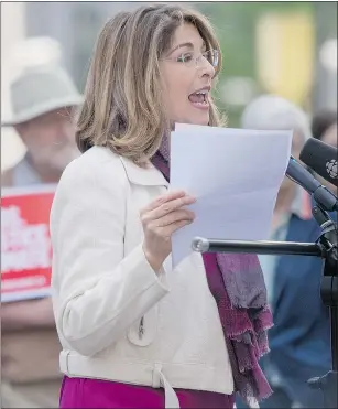  ?? TYLER ANDERSON/NATIONAL POST ?? Social activist Naomi Klein speaks at a climate change rally on Thursday in downtown Toronto in support the March for Jobs, Justice and the Climate, which takes place in July.