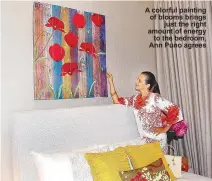  ??  ?? A colorful painting of blooms brings
just the right amount of energy
to the bedroom, Ann Puno agrees