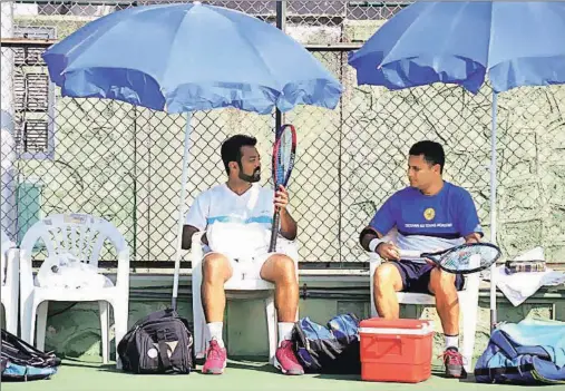  ?? Daniel Stephen ?? Leander Paes with coach Zeeshan Ali at a practice session at Pune’s Balewadi Stadium on Monday. The 43-year-old’s career may come to an end after India’s Davis Cup tie against New Zealand.