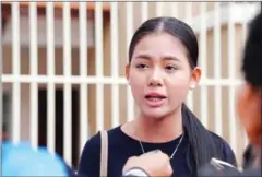  ?? HONG MENEA ?? Social media star Thy Sovantha, seen speaking outside the Phnom Penh court, won a defamation case against former opposition leader Sam Rainsy last year.