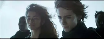 ?? WARNER BROS. PICTURES ?? Zendaya and Timothee Chalamet are shown in a scene from director Denis Villeneuve’s upcoming adaptation of “Dune.”