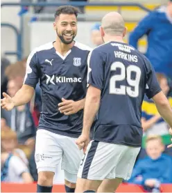  ?? Pictures: SNS Group. ?? Far left: Kane Hemmings heads the ball home for Dundee’s opening goal; left: the Dark Blues striker celebrates in front of home fans with team-mates James McPake and Greg Stewart and, above, with Gary Harkins.