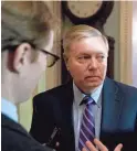  ?? ANDREW HARNIK/AP ?? ABOVE: Sen. Lindsey Graham, R-S.C., has said failure on the tax bill was “not an option.”