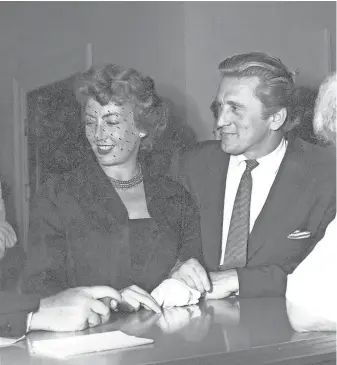  ?? RUNNING PRESS ?? Kirk and Anne Douglas on their wedding day in 1954.