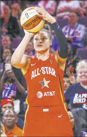  ??  ?? Aces guard Kayla McBride shoots in the second half of the WNBA All-Star Game on Saturday. She finished with 13 points in a 129126 victory by Team Wilson over Team Delle Donne.