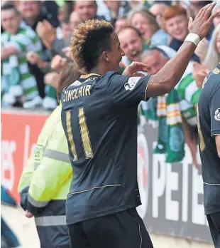  ??  ?? James Forrest (right) celebrates with Tom Rogic and Scott Sinclair