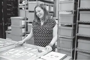  ?? Jessica Phelps / Staff photograph­er ?? Rhiana Ward, assistant director of cultural resources at San Antonio-based Raba Kistner, looks over artifacts she and her team uncovered during a recent excavation.