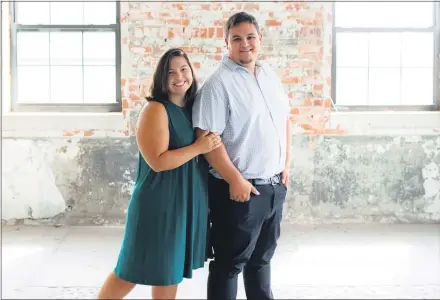  ?? SUBMITTED PHOTO ?? Grace and Matt Rauppius stand inside a building in Coatesvill­e that will be home to a new venture they are starting after coronaviru­s devastated their wedding photograph­y business.