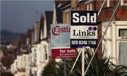  ?? Photograph: Yui Mok/PA ?? The average price of a house in the UK is £248,742, about 13% higher than before the pandemic began.