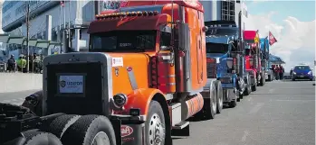  ?? DARRYL DYCK/THE CANADIAN PRESS FILES ?? Port Metro Vancouver brought the new licensing system in as part of the agreement to end last year’s 28-day work stoppage by drivers at port terminals, which caused massive delays to container deliveries.