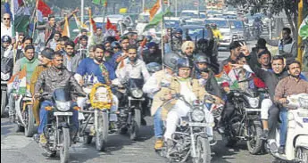  ?? KARUN SHARMA/HT ?? Haryana Pradesh Congress Committee president Ashok Tanwar with party workers during a bike rally in Chandigarh on Sunday. He also participat­ed in a similar rally in Karnal.