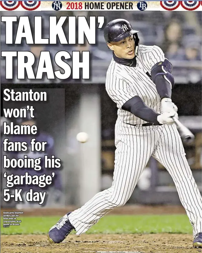  ??  ?? Giancarlo Stanton strikes out for fifth time in regrettabl­e first game in Bronx.