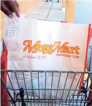  ??  ?? A bag utilised by a MegaMart shopper in St James.