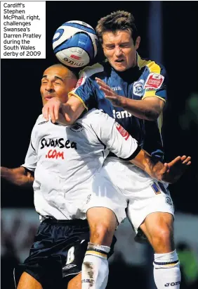  ??  ?? Cardiff’s Stephen McPhail, right, challenges Swansea’s Darren Pratley during the South Wales derby of 2009